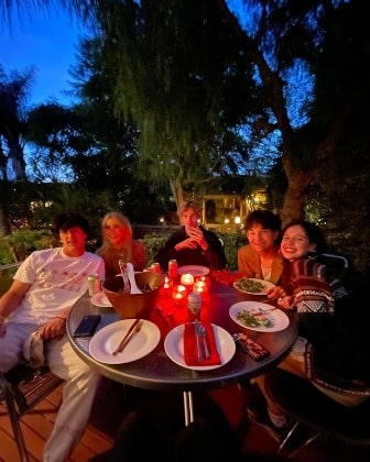 Cecilia Marti Chasman wearing mixed color sweater.